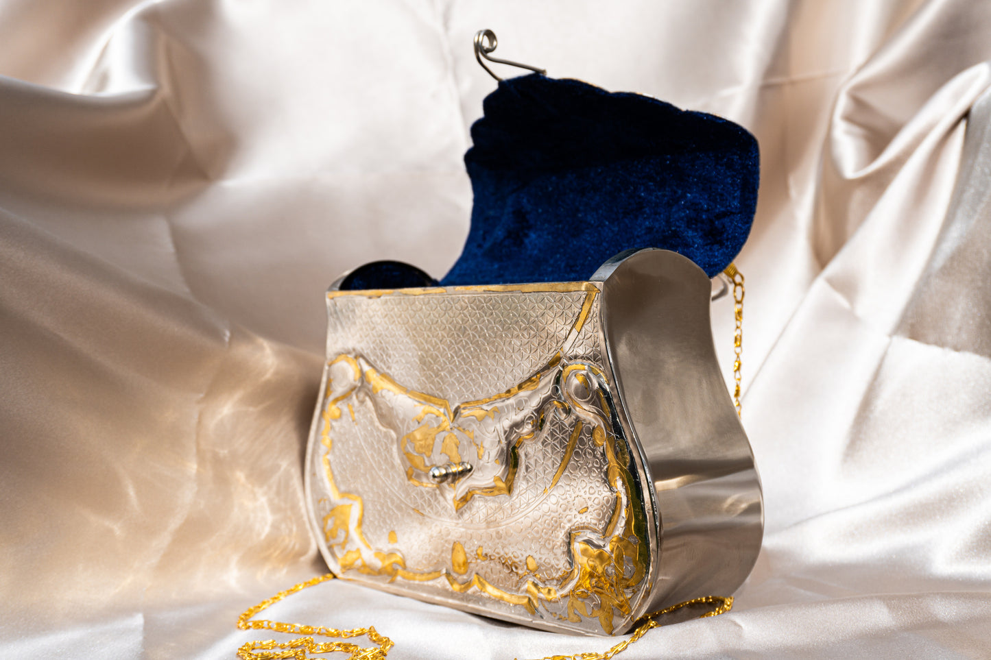 Ida - Handmade Bag, close-up side angle view with open blue velvet interior
